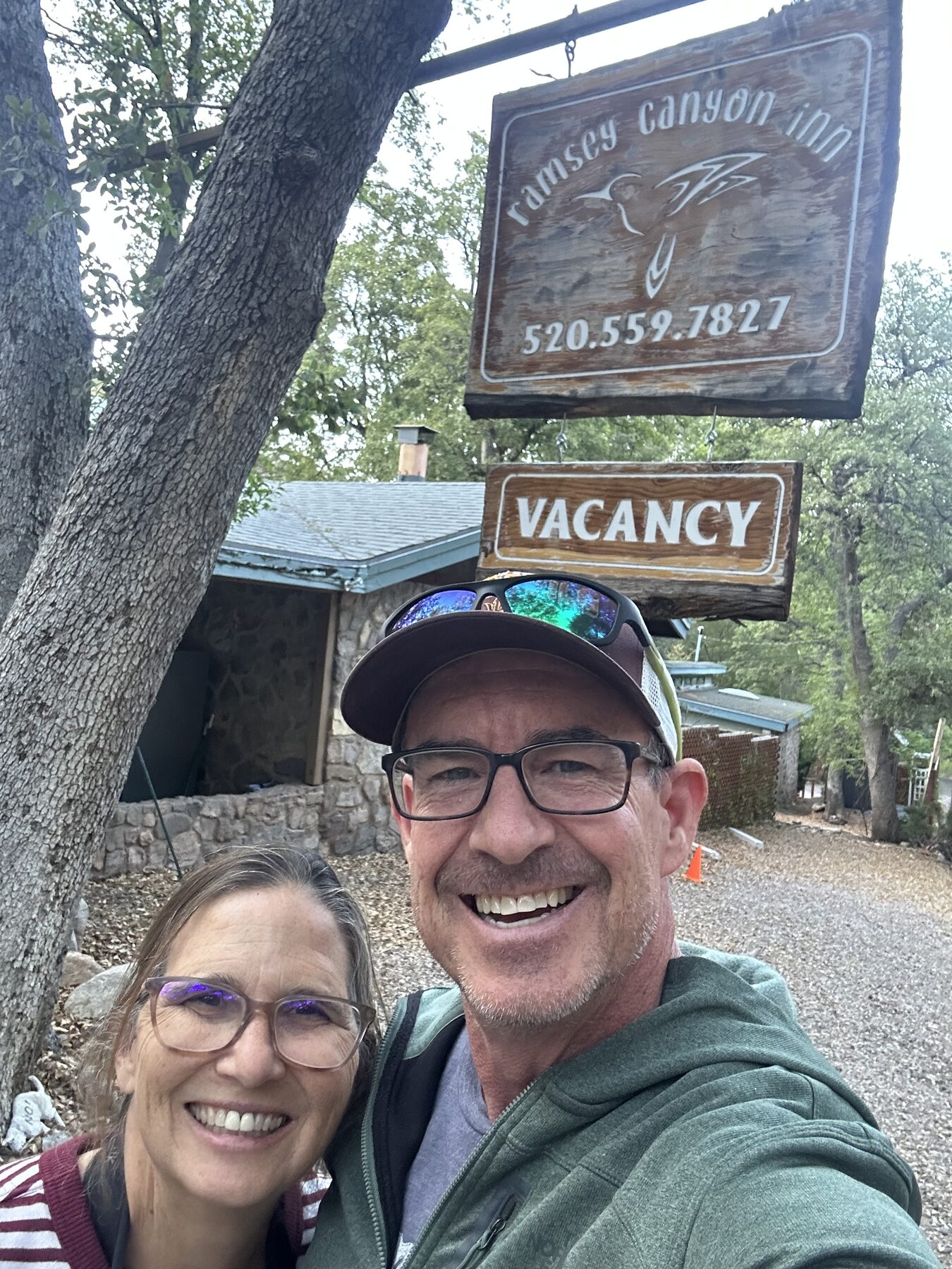 Brice and Christy Semmens at the Ramsey Canyon Inn sign